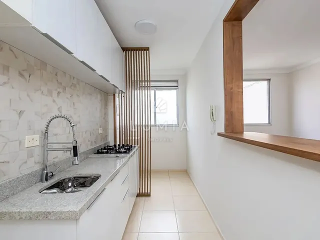 Imagem: O apartamento possui 2 Dormitórios, 1 Suíte, 2 Banheiros,