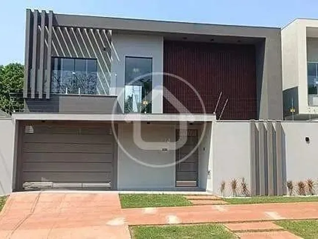 Imagem: A casa possui 3 Dormitórios, 2 Banheiros, 2 Vagas na