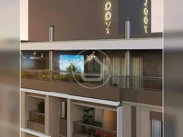 Imagem: O apartamento possui 2 Dormitórios, 2 Suítes, 1 Banheiro,