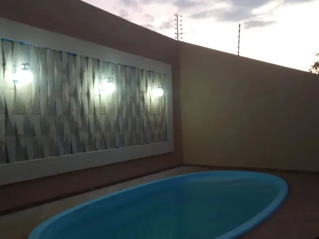 Imagem: A casa possui 3 Dormitórios, 2 Banheiros, 3 Vagas na garagem