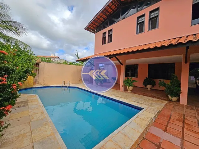Imagem: Ampla casa com 5 suítes e piscina privativa