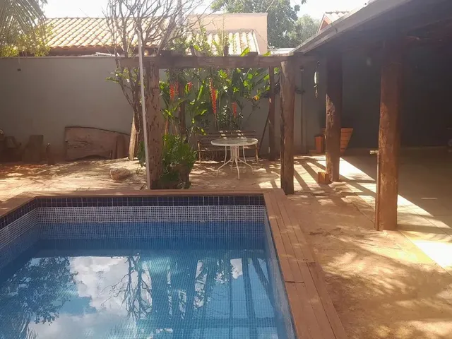 Imagem: A casa possui 2 Dormitórios, Acomodam 25 pessoas, 2 Vagas
