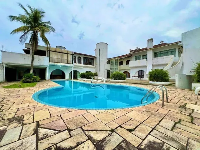 Imagem: A casa possui 5 Dormitórios, 7 Suítes, 5 Banheiros,