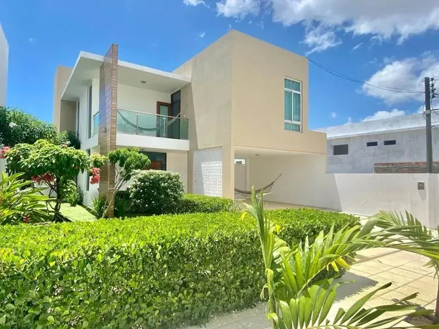 Imagem: A casa em condomínio possui 4 Dormitórios, 4 Suítes, 5