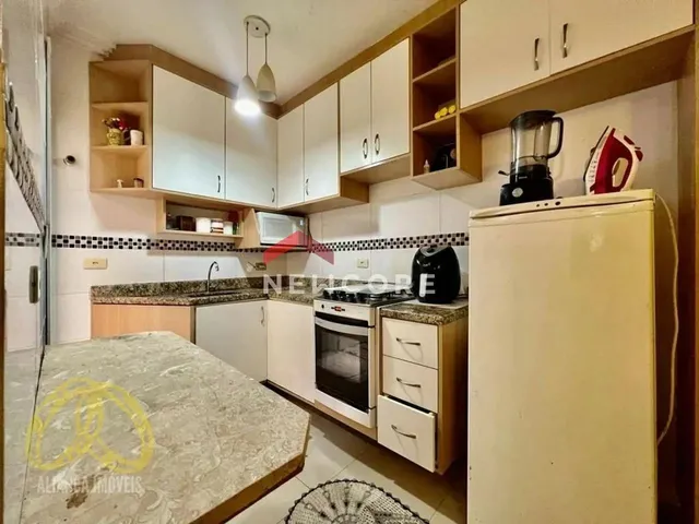 Imagem: O apartamento possui 2 Dormitórios, 1 Suíte, 2 Banheiros,