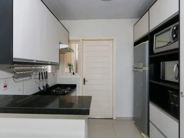 Imagem 10: Casa com 2 Quartos para Alugar no Bairro Olaria com 65M²