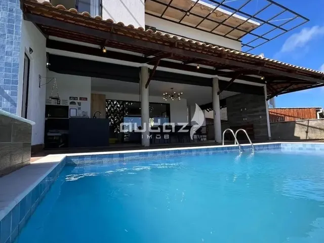 Imagem: A casa em condomínio possui 4 Dormitórios, 4 Suítes, 5