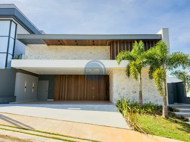Imagem: A casa em condomínio possui 4 Dormitórios, 4 Suítes, 5