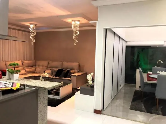 Imagem: A casa em condomínio possui 4 Dormitórios, 3 Suítes, 5