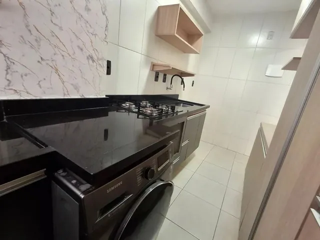 Imagem 8: Apartamento 60M² com 2 Quartos, Suíte, Varanda, Armários Completos e Vaga de Garagem