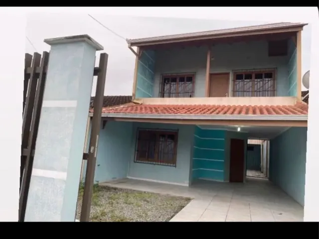 Imagem: A casa possui 3 Dormitórios, 3 Banheiros, 1 Vaga na