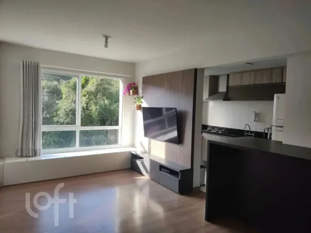 Imagem: O apartamento possui 2 Dormitórios, 1 Suíte, 2 Banheiros,