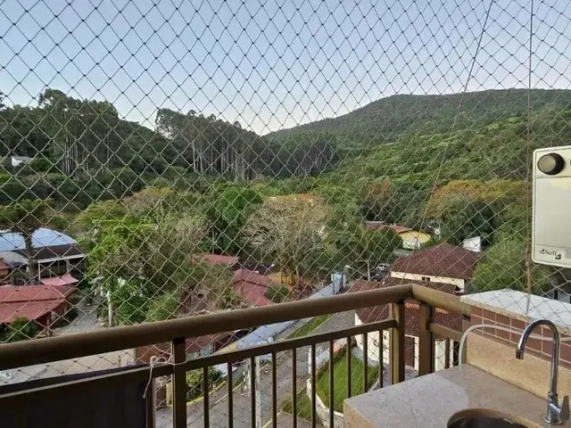 Imagem: O apartamento possui 2 Dormitórios, 1 Suíte, 2 Banheiros,