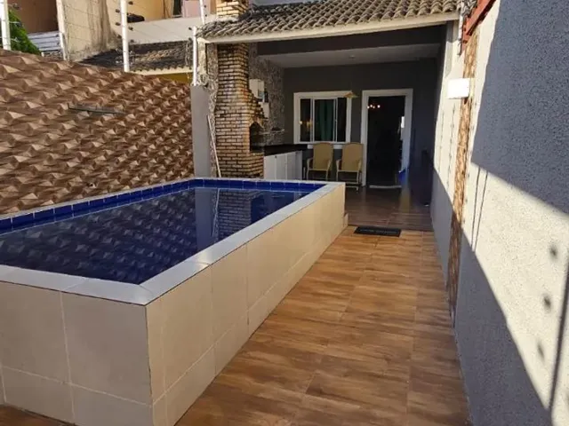 Imagem: Casa com Três Quartos Sendo Dois Suítes