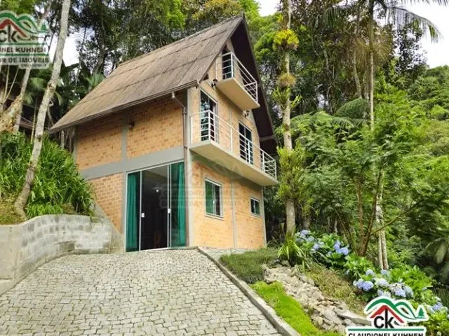 Imagem: Casa Estilo Chalé de Tijolo a Vista com