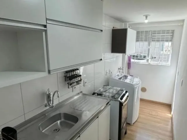 Imagem: O apartamento possui 2 Dormitórios, 1 Banheiro, 1 Vaga na