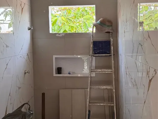 Imagem: A casa possui 2 Dormitórios, 1 Banheiro, 2 Vagas na