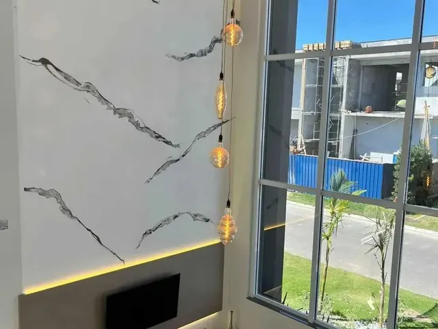 Imagem: Casa com 4 Suítes e 4 Vagas de Garagem