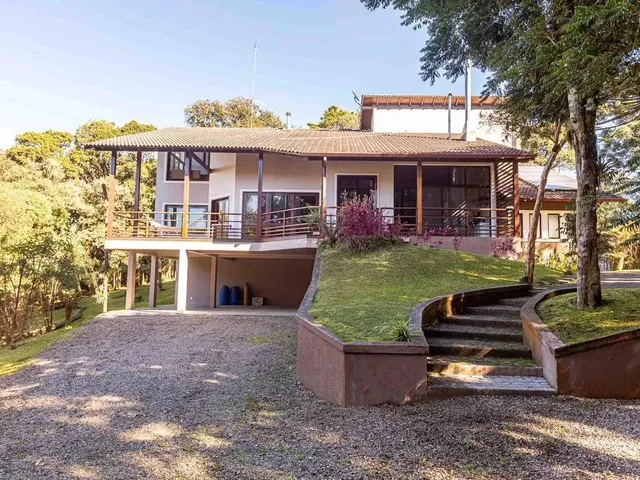 Imagem: A casa em condomínio possui 3 Dormitórios, 3 Suítes, 1