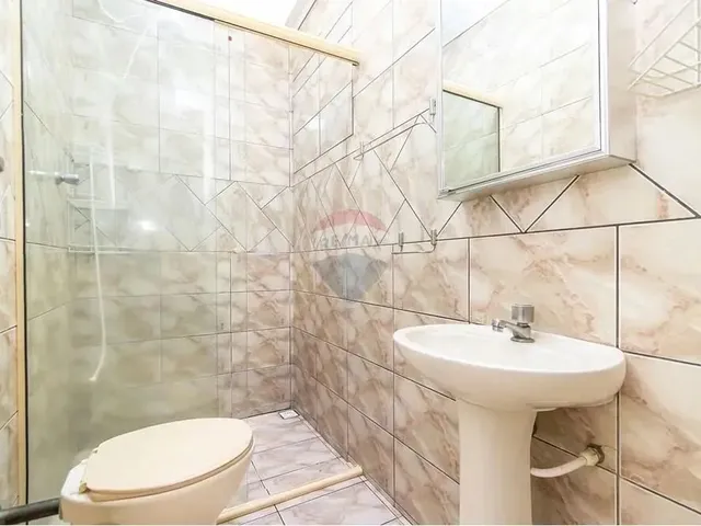 Imagem 3: Casa Térrea À Venda, 3 Quartos, com Churrasqueira e Garagem Coberta para 2 Carros