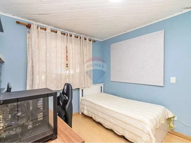 Imagem 6: Casa Térrea À Venda, 3 Quartos, com Churrasqueira e Garagem Coberta para 2 Carros