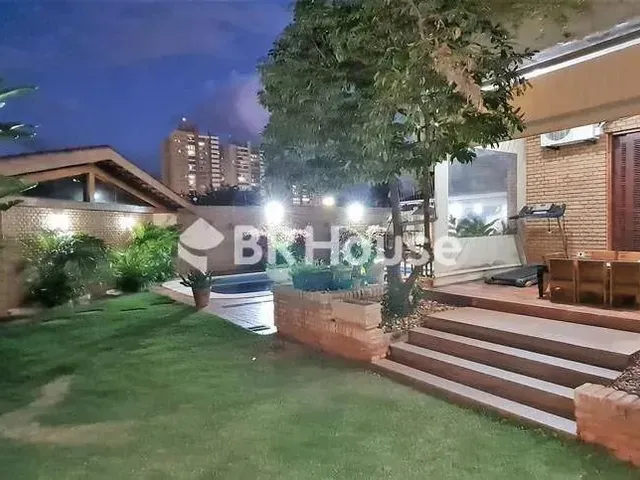 Imagem: A casa possui 4 Dormitórios, 2 Suítes, 5 Banheiros, 4