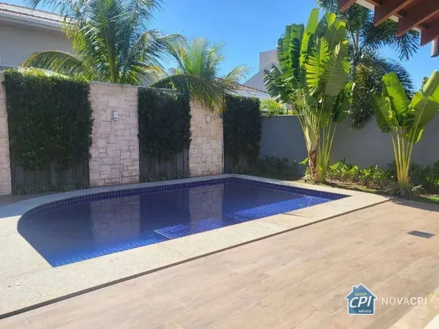 Imagem: A casa possui 3 Dormitórios, 3 Suítes, 4 Banheiros, 3
