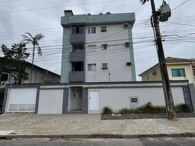 Imagem: O apartamento possui 2 Dormitórios, 1 Suíte, 2 Banheiros,