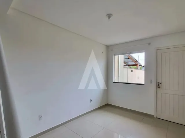 Imagem 2: Geminado com 2 Quartos, Sendo 1 Deles com Sacada, 1 Banheiro Social e 2 Vaga de Garagem No