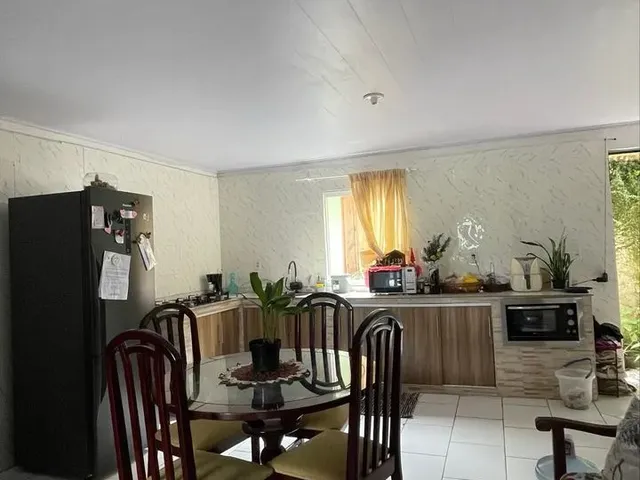 Imagem: A casa possui 2 Dormitórios, 1 Banheiro, 1 Vaga na