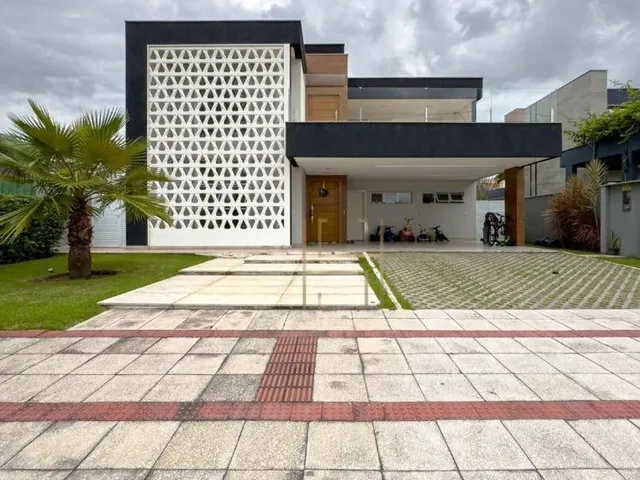 Imagem: A casa em condomínio possui 4 Dormitórios, 3 Suítes, 5