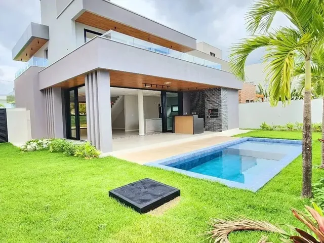 Imagem 1: Casa com 4 Quartos (3 Suítes) À Venda