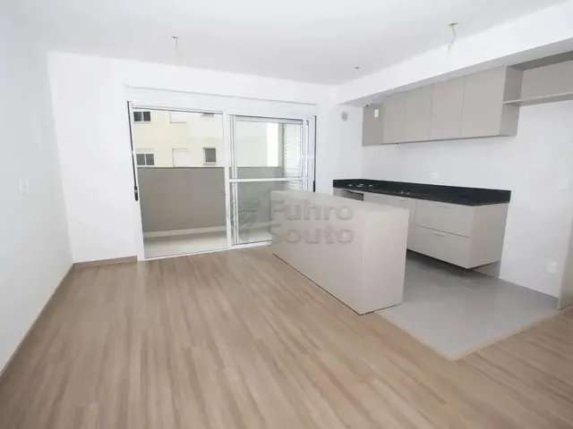 Imagem: O apartamento possui 2 Dormitórios, 1 Suíte, 2 Banheiros,