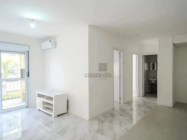 Imagem: O apartamento possui 2 Dormitórios, 1 Banheiro, 1 Vaga na