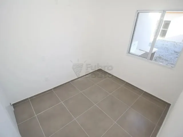 Imagem 13: Casa Aconchegante no Condomínio Altos do Jerivás - Tranquilidade e Conforto no Bairro
