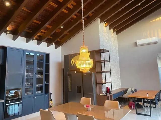 Imagem 15: Casa de Luxo no Florais do Valle: 3 Suítes, Piscina Aquecida e Acabamentos de Alta
