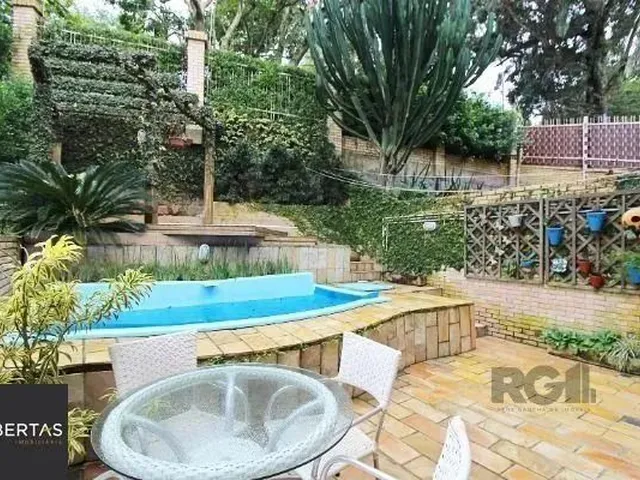 Imagem 13: Casa Condominio em Porto Alegre, no Bairro Sétimo Céu, com 4 Dormitório(S), e 4