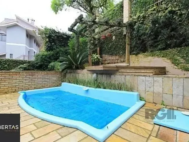 Imagem 5: Casa Condominio em Porto Alegre, no Bairro Sétimo Céu, com 4 Dormitório(S), e 4