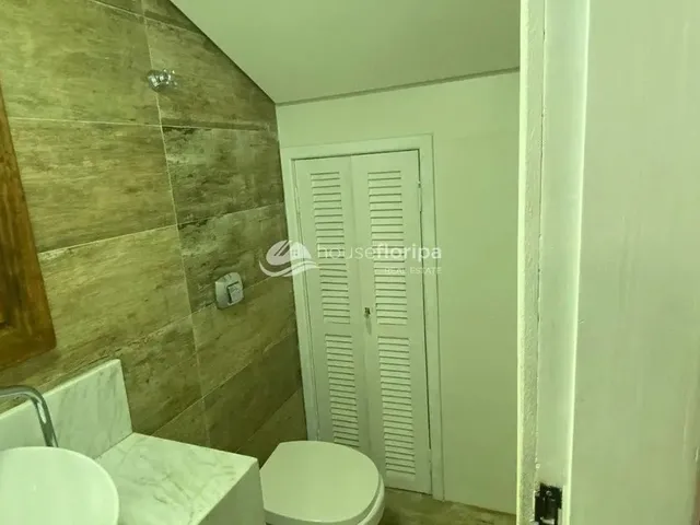 Imagem 13: Casa Triplex Aconchegante com 3 Dormitórios, Suíte e Vista Panorâmica no Condomínio