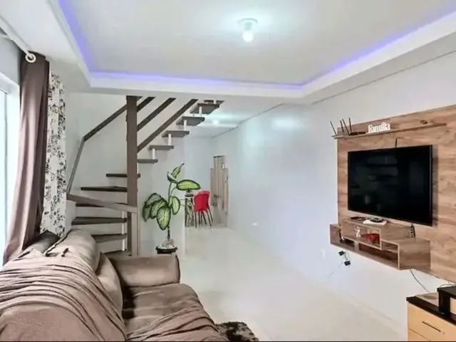 Imagem: A casa possui 3 Dormitórios, 3 Suítes, 4 Banheiros, 1