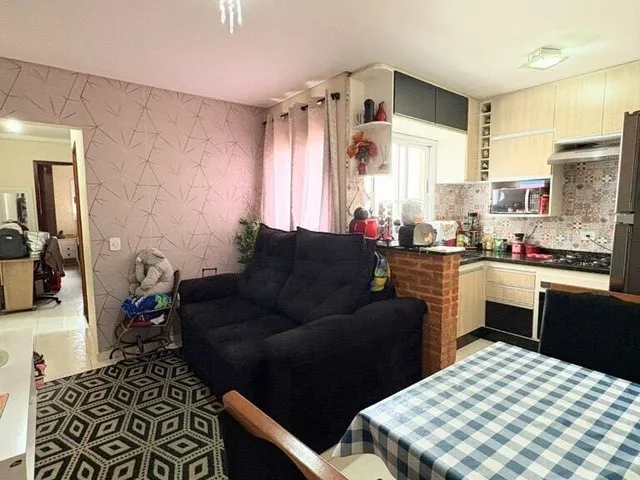 Imagem: O apartamento possui 2 Dormitórios, 1 Suíte, 2 Banheiros,