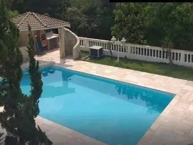 Imagem: A casa em condomínio possui 3 Dormitórios, 3 Suítes, 5