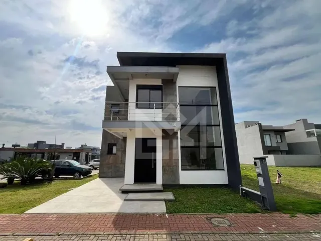 Imagem 6: Sobrado de Luxo com 3 Dormitórios e Área Gourmet: Viva a Exclusividade no Residencial