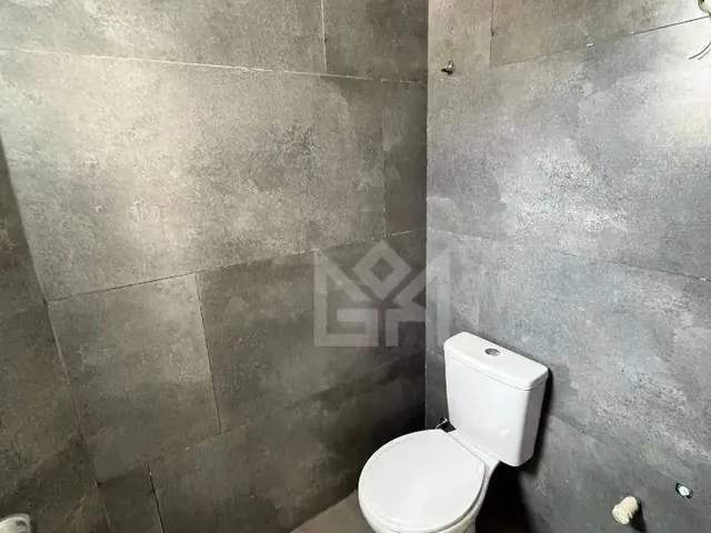 Imagem 13: Sobrado de Luxo com 3 Dormitórios e Área Gourmet: Viva a Exclusividade no Residencial