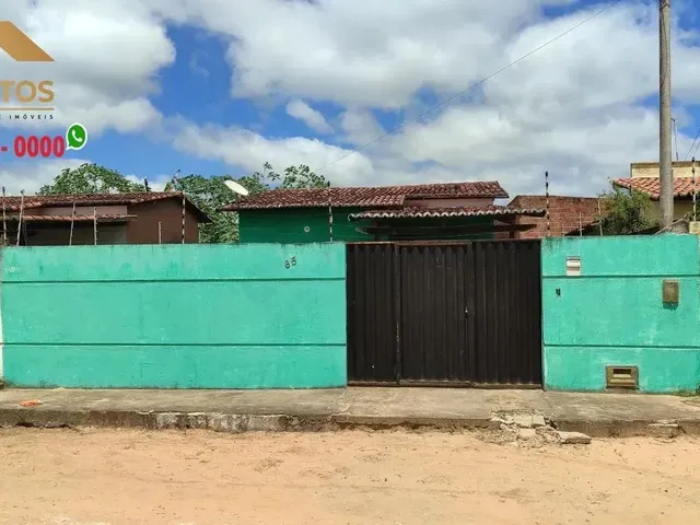 Imagem: A casa possui 2 Dormitórios, 1 Banheiro, 2 Vagas na