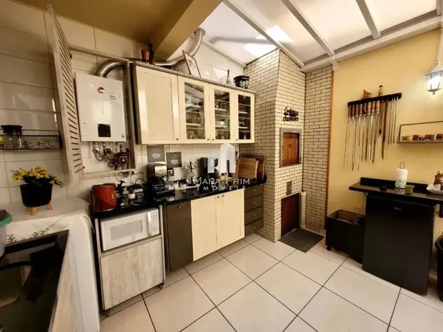 Imagem 12: Sobrado com 4 Dormitórios À Venda por R$805.000,00, 148M² - Tarumã - Curitiba/Pr