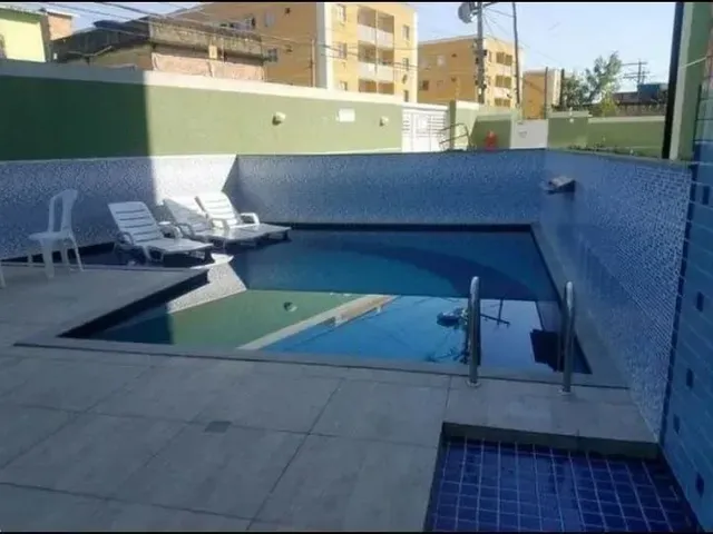 Imagem: O apartamento possui 2 Dormitórios, 2 Banheiros, Acomodam