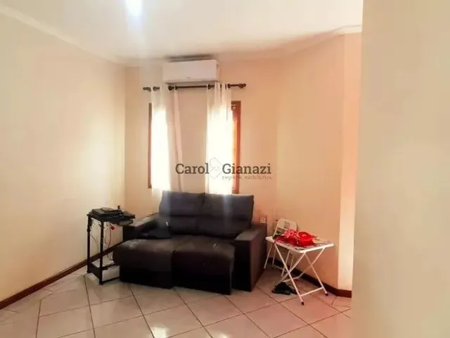 Imagem: A casa possui 3 Dormitórios, 1 Suíte, 2 Banheiros, 2