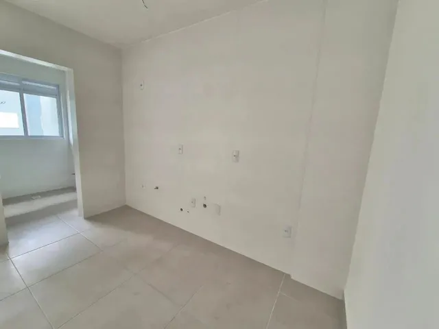 Imagem 7: Imóvel para Venda Possui 62 Metros Quadrados com 2 Quartos em São Luiz - Criciúma - Sc