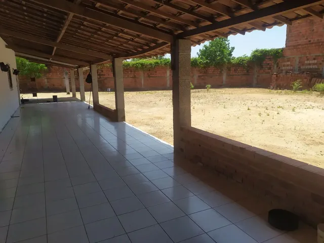 Imagem 2: Casa. Área de serviço, 910m² de Área, 3 Vagas na garageme2...